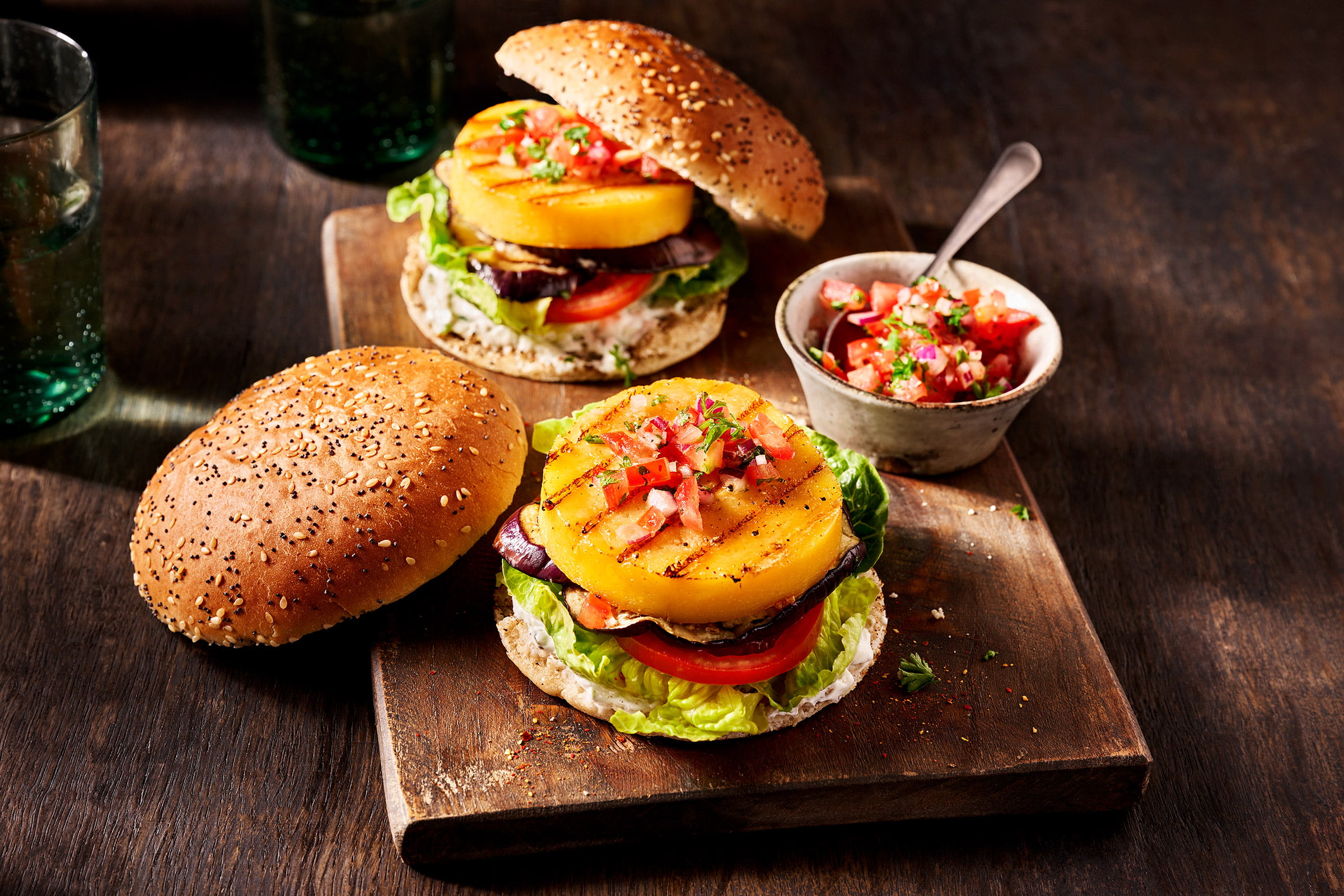 Tasty grill Burger with cucumber yoghurt, grilled eggplant and tomato salsa